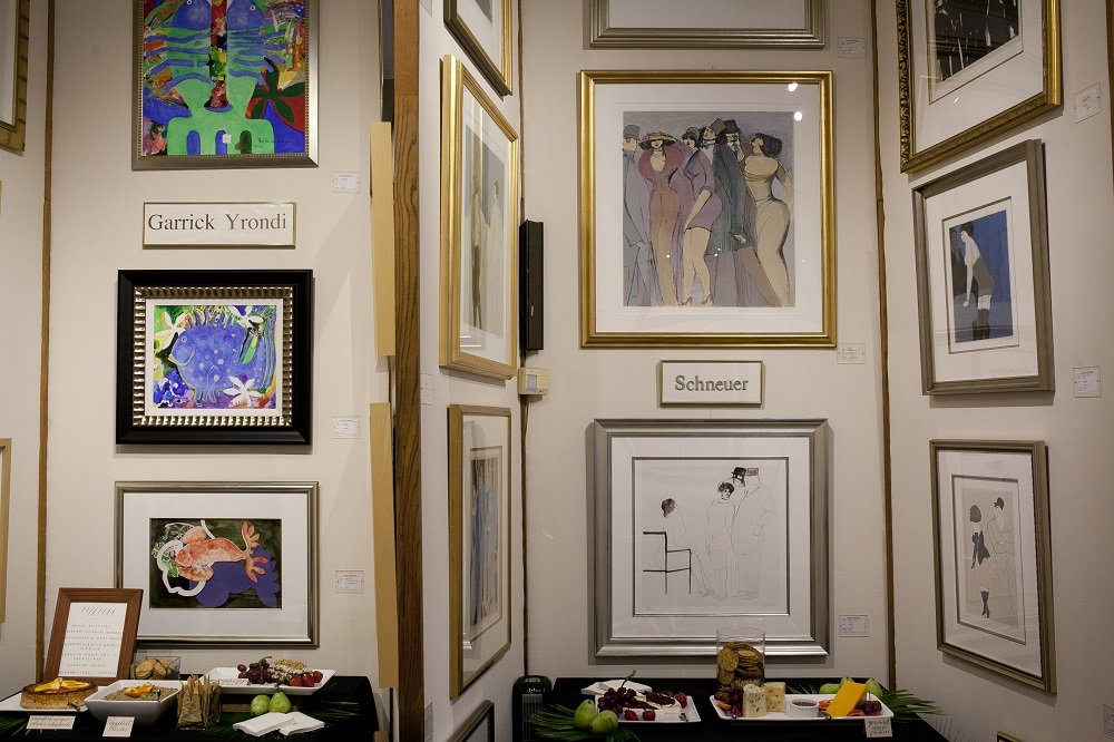 Elliott Gallery downstairs event space with artwork displayed for an art collection